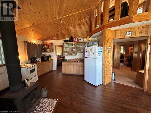 Functional kitchen with wood stove - 8 Carter Road, Northern Bruce Peninsula, ON - Indoor