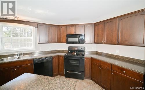 26 Terrace Drive, Rusagonis, NB - Indoor Photo Showing Kitchen With Double Sink