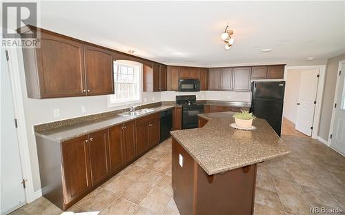 26 Terrace Drive, Rusagonis, NB - Indoor Photo Showing Kitchen With Double Sink