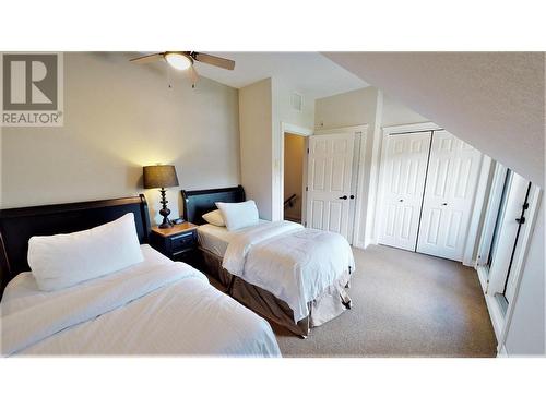 200 Bighorn  Boulevard Unit# 234 A, Radium Hot Springs, BC - Indoor Photo Showing Bedroom