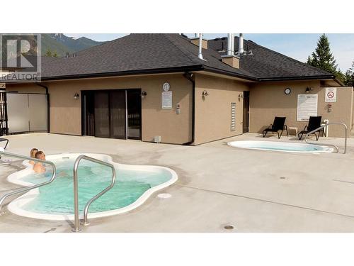 200 Bighorn  Boulevard Unit# 234 A, Radium Hot Springs, BC - Outdoor With In Ground Pool