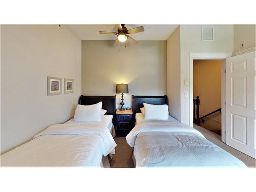 234 A - 200 Bighorn Boulevard, Radium Hot Springs, BC - Indoor Photo Showing Bedroom