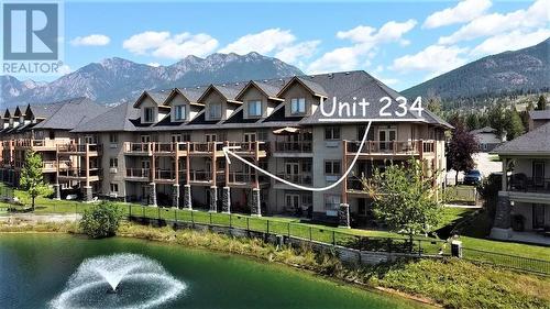 200 Bighorn  Boulevard Unit# 234 A, Radium Hot Springs, BC - Outdoor With Body Of Water With Facade