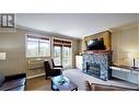 200 Bighorn  Boulevard Unit# 234 A, Radium Hot Springs, BC  - Indoor Photo Showing Living Room With Fireplace 