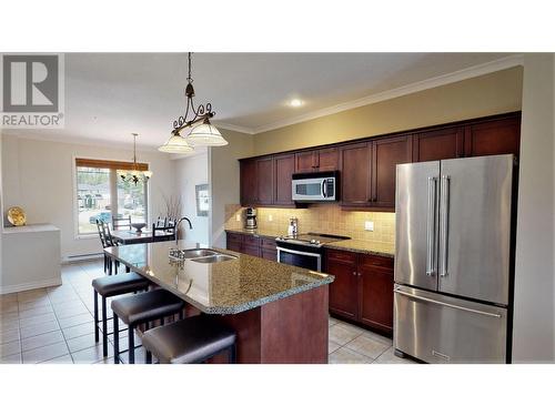 200 Bighorn  Boulevard Unit# 234 A, Radium Hot Springs, BC - Indoor Photo Showing Kitchen With Double Sink