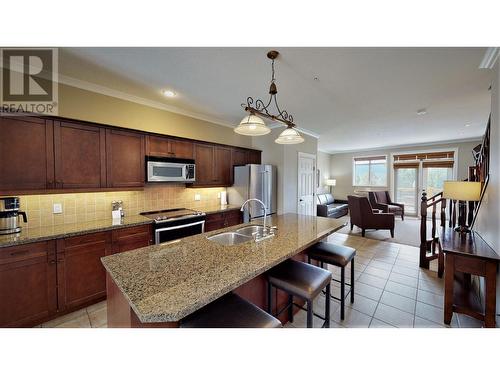 200 Bighorn  Boulevard Unit# 234 A, Radium Hot Springs, BC - Indoor Photo Showing Kitchen With Double Sink With Upgraded Kitchen