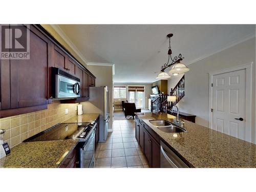 200 Bighorn  Boulevard Unit# 234 A, Radium Hot Springs, BC - Indoor Photo Showing Kitchen With Double Sink