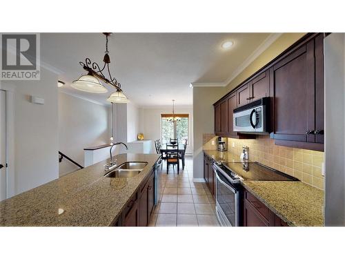 200 Bighorn  Boulevard Unit# 234 A, Radium Hot Springs, BC - Indoor Photo Showing Kitchen With Double Sink