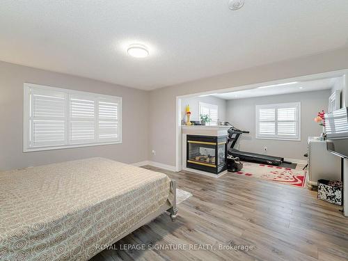3215 Tacc Dr, Mississauga, ON - Indoor Photo Showing Bedroom With Fireplace