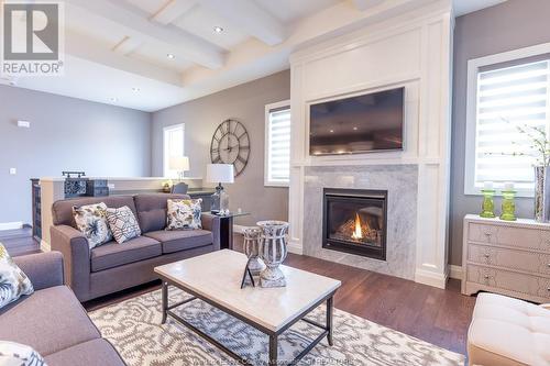 7478 Silverleaf Street, Lasalle, ON - Indoor Photo Showing Living Room With Fireplace