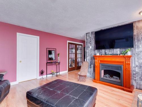 Living room - 176 Rue Ross, Gatineau (Buckingham), QC - Indoor With Fireplace