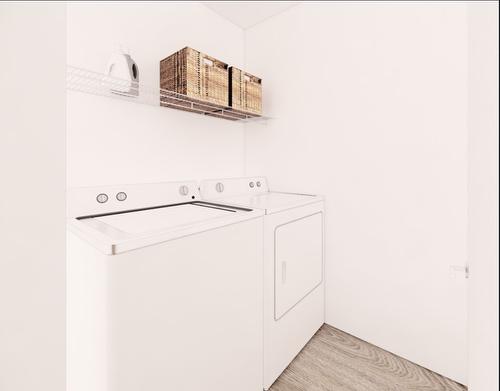 Overall view - 308-200 Rue Angélique-Gazaille, Otterburn Park, QC - Indoor Photo Showing Laundry Room