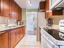 2504-3100 Kirwin Ave, Mississauga, ON  - Indoor Photo Showing Kitchen With Double Sink 