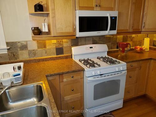 29 Hook Ave, Toronto, ON - Indoor Photo Showing Kitchen With Double Sink