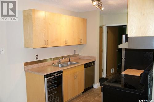 416 310 Stillwater Drive, Saskatoon, SK - Indoor Photo Showing Kitchen With Double Sink