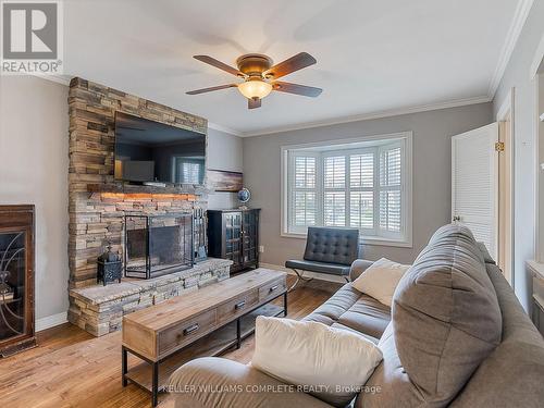 4 Cambria Crt, Hamilton, ON - Indoor Photo Showing Living Room With Fireplace