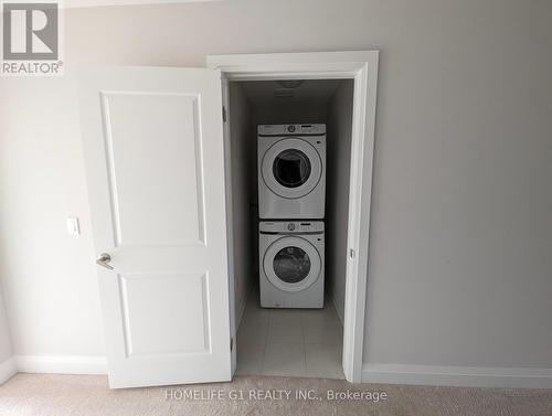26 Robert Wyllie Street, North Dumfries, ON - Indoor Photo Showing Laundry Room