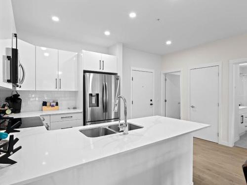 212-1880 Hugh Allan Drive, Kamloops, BC - Indoor Photo Showing Kitchen With Stainless Steel Kitchen With Double Sink With Upgraded Kitchen