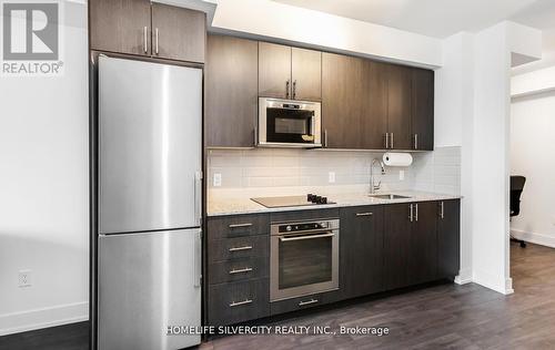 212 - 2550 Simcoe Street N, Oshawa, ON - Indoor Photo Showing Kitchen With Stainless Steel Kitchen With Upgraded Kitchen