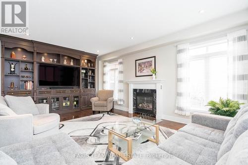 36 Royal Park Blvd, Barrie, ON - Indoor Photo Showing Living Room With Fireplace