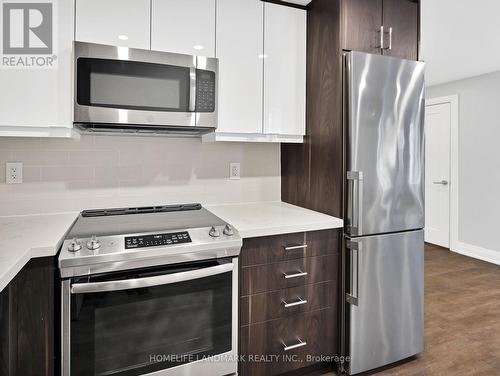 102 - 699 Eglinton Avenue W, Toronto, ON - Indoor Photo Showing Kitchen With Stainless Steel Kitchen