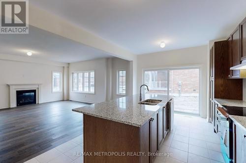 1215 Drinkle Cres, Oshawa, ON - Indoor Photo Showing Kitchen With Fireplace With Double Sink