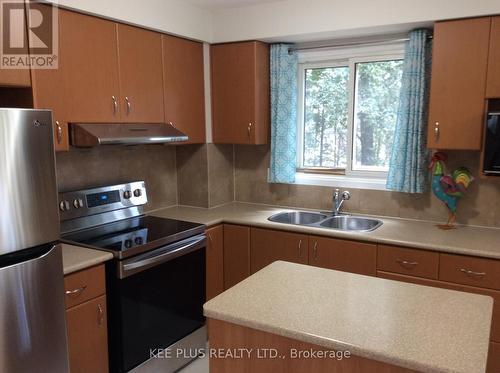 12 - 2359 Birchmount Road, Toronto, ON - Indoor Photo Showing Kitchen With Double Sink