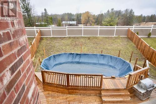 1960 Mcneil St, Innisfil, ON - Outdoor With Above Ground Pool