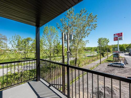 Vue d'ensemble - 406-330 Mtée Du Comté, Les Coteaux, QC - Outdoor With Exterior