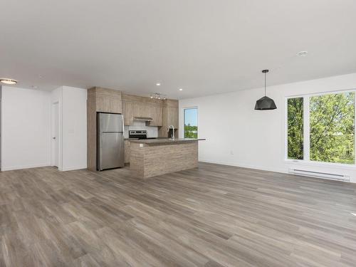 Overall view - 406-330 Mtée Du Comté, Les Coteaux, QC - Indoor Photo Showing Kitchen