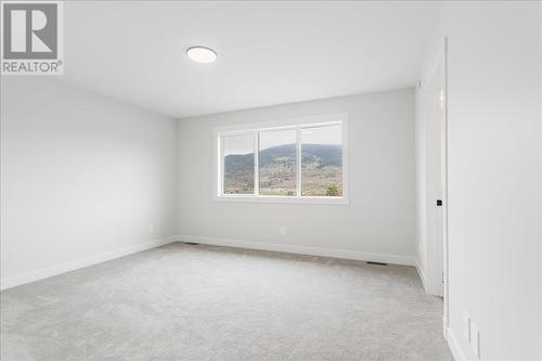 309 Arrowleaf Rise, Coldstream, BC - Indoor Photo Showing Other Room