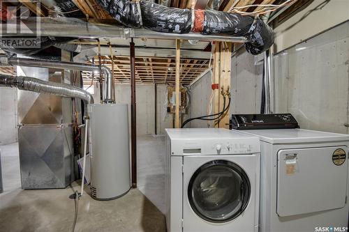 8 106 Baillie Cove, Saskatoon, SK - Indoor Photo Showing Laundry Room