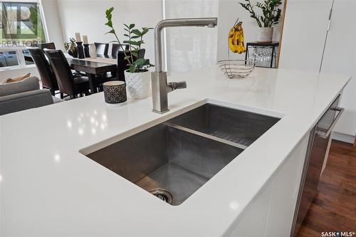 125 Elm Street E, Saskatoon, SK - Indoor Photo Showing Kitchen With Double Sink