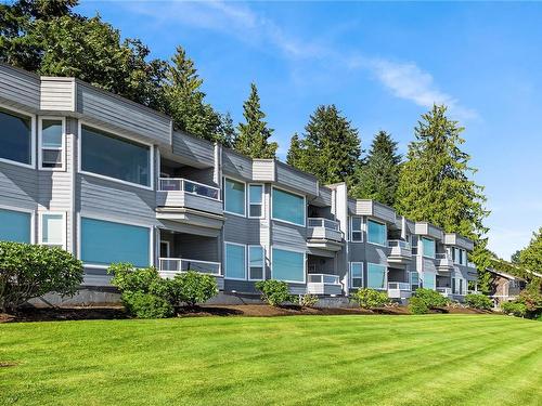 102-3132 Island Hwy West, Qualicum Beach, BC - Outdoor With Balcony With Facade
