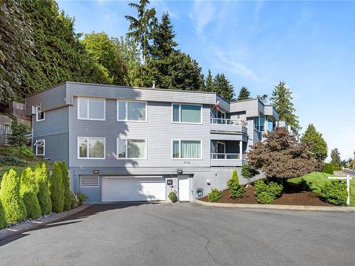 102-3132 Island Hwy West, Qualicum Beach, BC - Outdoor With Balcony With Facade