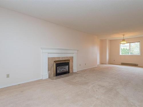 4678 Sunnymead Way, Saanich, BC - Indoor Photo Showing Living Room With Fireplace