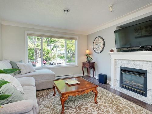 3055 Albany St, Saanich, BC - Indoor Photo Showing Living Room With Fireplace