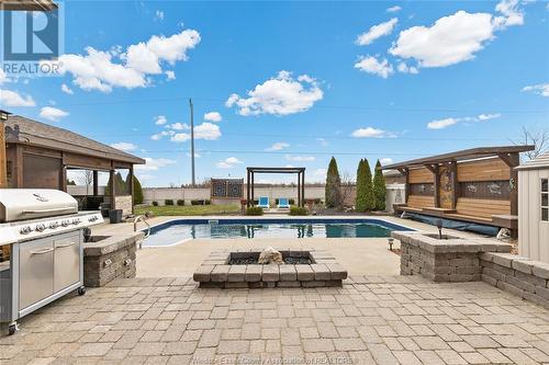 579 Stallion, Lakeshore, ON - Outdoor With In Ground Pool