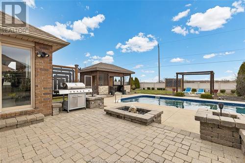 579 Stallion, Lakeshore, ON - Outdoor With In Ground Pool