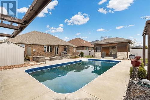 579 Stallion, Lakeshore, ON - Outdoor With In Ground Pool With Backyard