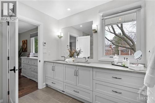 Ensuite with double vanity, glass shower, heated floors. - 10 Okanagan Drive, Ottawa, ON - Indoor Photo Showing Bathroom