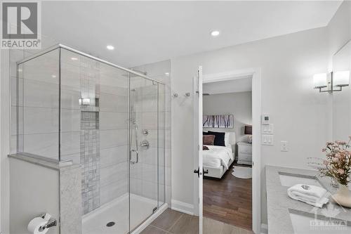 Ensuite with double vanity, glass shower, heated floors. - 10 Okanagan Drive, Ottawa, ON - Indoor Photo Showing Bathroom