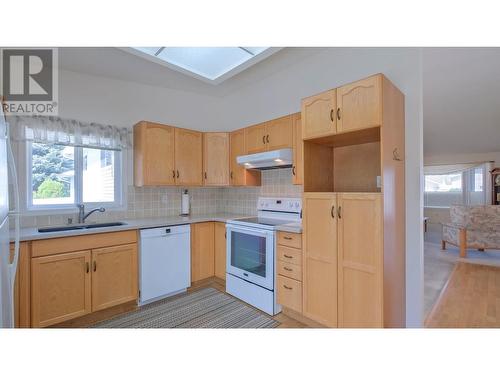 3400 Wilson Street Unit# 105, Penticton, BC - Indoor Photo Showing Kitchen With Double Sink