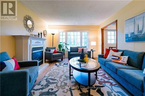 22 Vanier Crt, St. Catharines, ON - Indoor Photo Showing Living Room With Fireplace