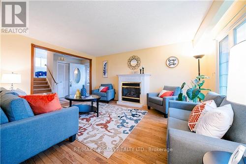 22 Vanier Crt, St. Catharines, ON - Indoor Photo Showing Living Room With Fireplace