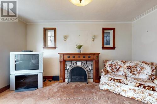 193 Sixth St, Toronto, ON - Indoor Photo Showing Living Room With Fireplace