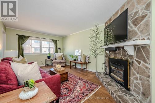 #77 -295 Water St, Guelph, ON - Indoor Photo Showing Living Room With Fireplace
