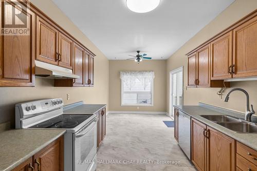 28 Ritchie Crescent, Springwater, ON - Indoor Photo Showing Kitchen With Double Sink