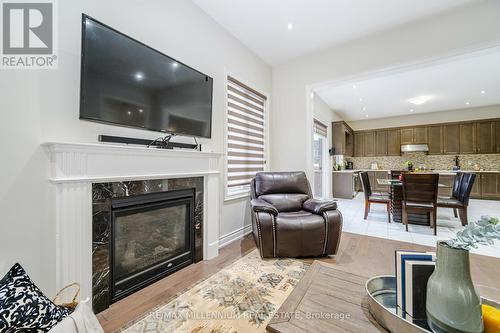 52 Fanning Tr, Brampton, ON - Indoor Photo Showing Living Room With Fireplace