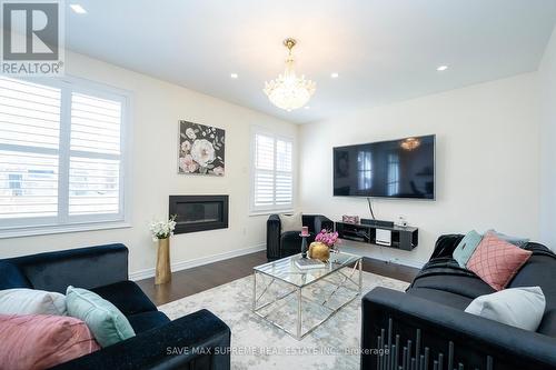 24 Argelia Cres, Brampton, ON - Indoor Photo Showing Living Room With Fireplace